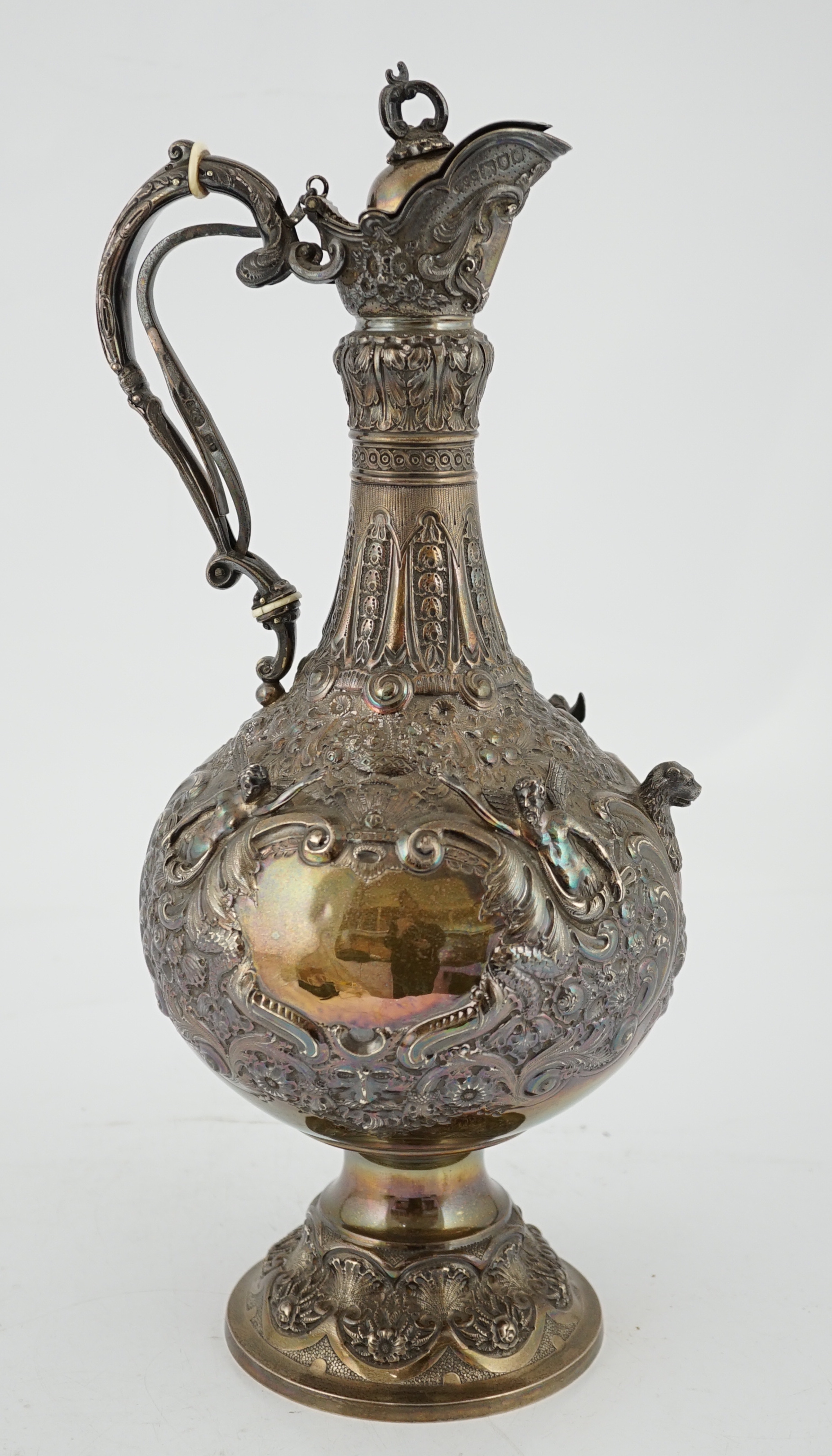 An ornate Victorian silver hot water jug, by Elkington & Co, CITES Submission reference UF9517NZ